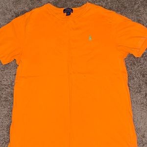 Orange polo shirt